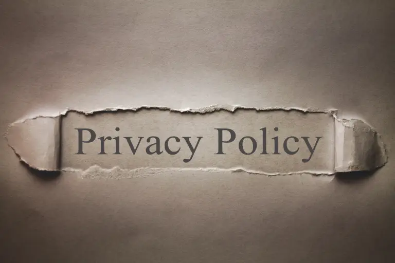 No link. Just an image of the words Privacy Policy on torn paper.